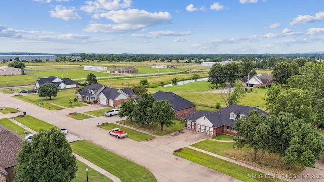 1018 W Evergreen St, Skiatook, OK 74070 - aerial view of residential area with a large body of water