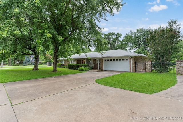 11420 S Mingo Rd, Bixby, OK 74008 - ranch-style home with a garage, driveway, brick siding, and a gate