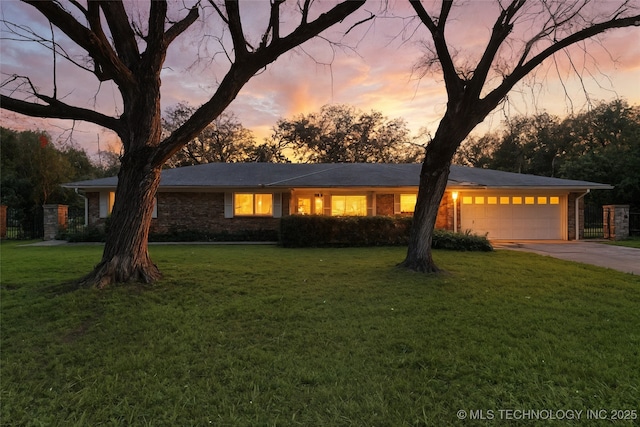 11420 S Mingo Rd, Bixby, OK 74008 - view of front facade with a garage, concrete driveway, a front lawn, and brick siding