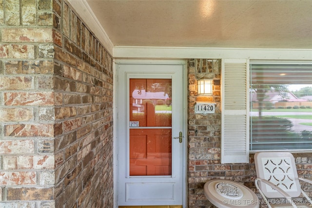 11420 S Mingo Rd, Bixby, OK 74008 - view of exterior entry featuring brick siding