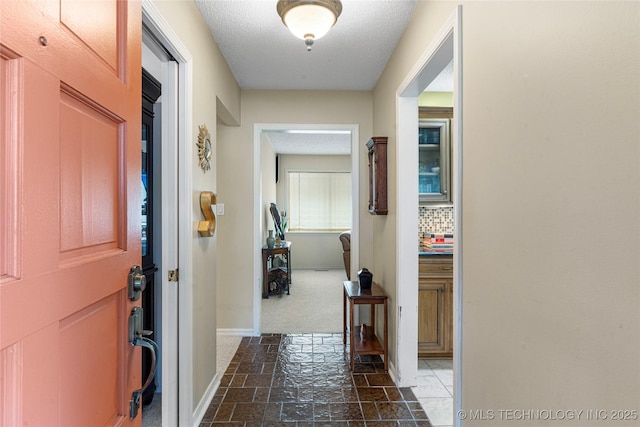 11420 S Mingo Rd, Bixby, OK 74008 - entryway with stone tile floors and baseboards