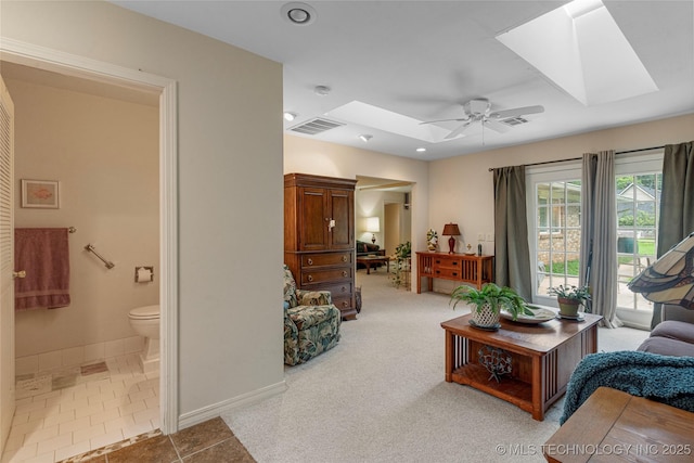 11420 S Mingo Rd, Bixby, OK 74008 - living room featuring a skylight, a ceiling fan, and recessed lighting