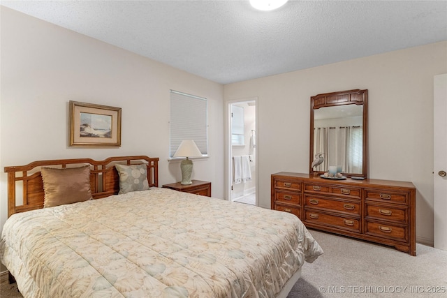 11420 S Mingo Rd, Bixby, OK 74008 - bedroom featuring light colored carpet and ensuite bath