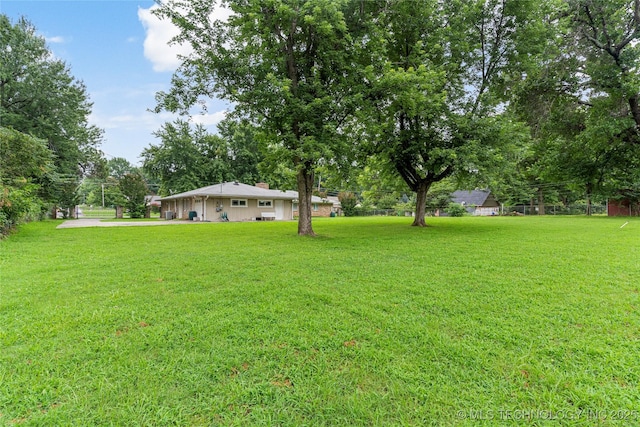 11420 S Mingo Rd, Bixby, OK 74008 - view of grassy yard featuring view of scattered trees