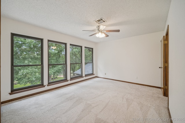 12526 S 12th St, Jenks, OK 74037 - carpeted empty room featuring a textured ceiling and ceiling fan