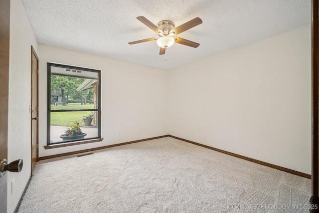 12526 S 12th St, Jenks, OK 74037 - empty room featuring carpet, a ceiling fan, and a textured ceiling