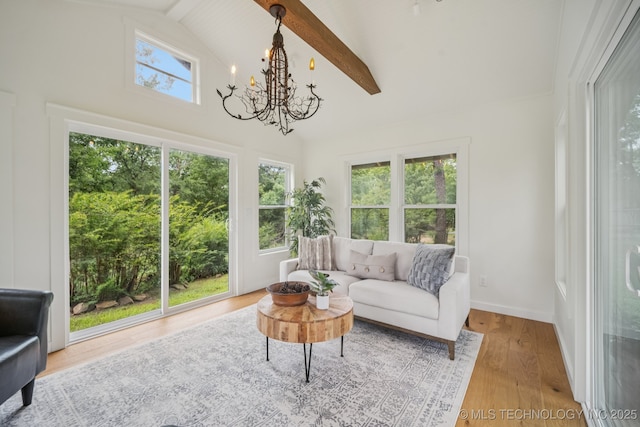 12526 S 12th St, Jenks, OK 74037 - living area with a chandelier, wood finished floors, beam ceiling, and high vaulted ceiling