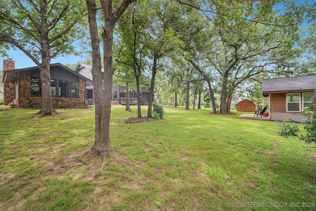 12526 S 12th St, Jenks, OK 74037 - view of green lawn featuring a shed