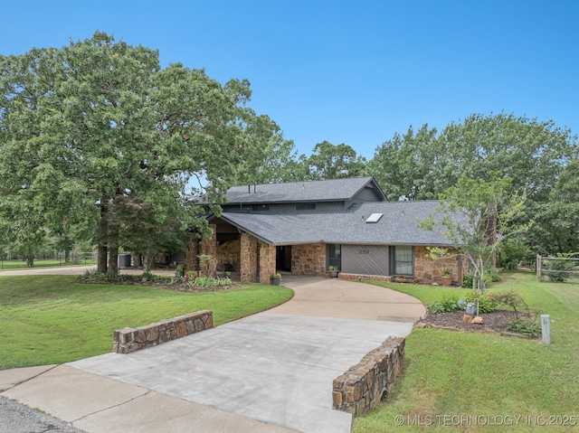 12526 S 12th St, Jenks, OK 74037 - mid-century inspired home featuring driveway, stone siding, a front lawn, and roof with shingles