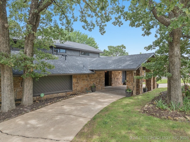 12526 S 12th St, Jenks, OK 74037 - mid-century home with stone siding, a shingled roof, concrete driveway, and an attached carport