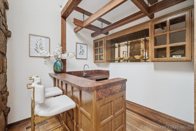 12526 S 12th St, Jenks, OK 74037 - indoor wet bar with coffered ceiling, beam ceiling, and wood finished floors