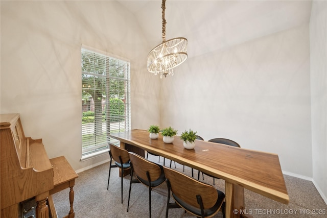 8404 E 98th Pl, Tulsa, OK 74133 - dining room with carpet flooring and a chandelier
