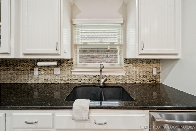 8404 E 98th Pl, Tulsa, OK 74133 - kitchen featuring stainless steel dishwasher, white cabinets, decorative backsplash, and dark stone counters
