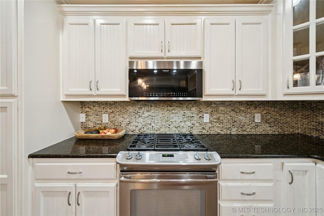 8404 E 98th Pl, Tulsa, OK 74133 - kitchen featuring appliances with stainless steel finishes, decorative backsplash, glass insert cabinets, and white cabinets