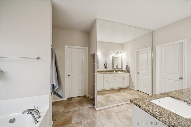 8404 E 98th Pl, Tulsa, OK 74133 - full bath with vanity and a garden tub