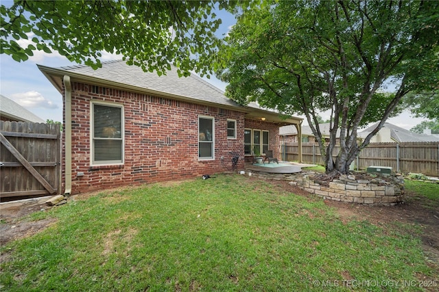 8404 E 98th Pl, Tulsa, OK 74133 - back of house featuring a patio area, brick siding, and a shingled roof