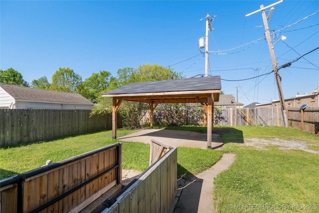 1510 S College Ave, Tulsa, OK 74104 - fenced backyard with a gazebo and a patio