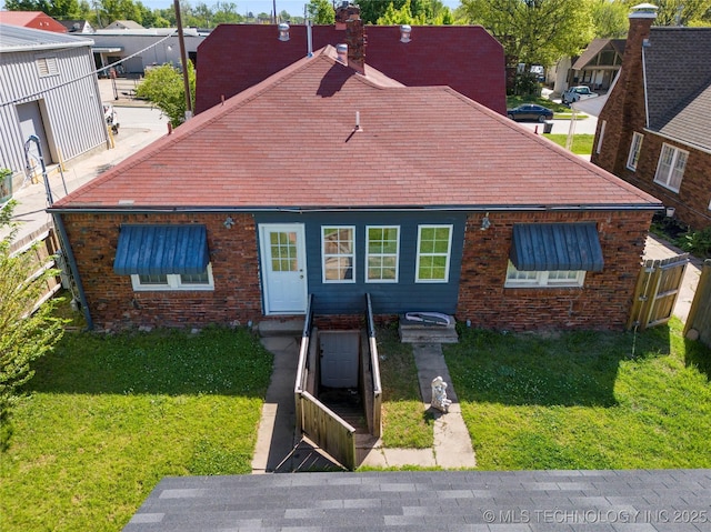 1510 S College Ave, Tulsa, OK 74104 - bungalow-style house with a chimney and brick siding