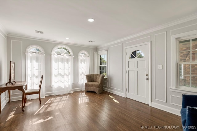 1510 S College Ave, Tulsa, OK 74104 - foyer with a decorative wall, crown molding, wood finished floors, and recessed lighting
