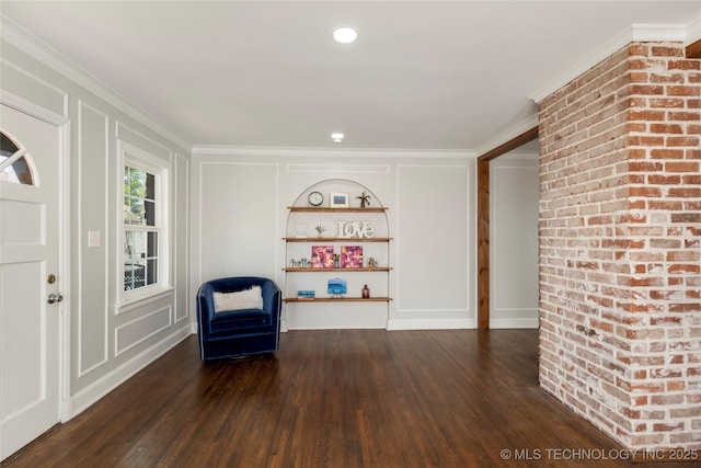 1510 S College Ave, Tulsa, OK 74104 - sitting room featuring a decorative wall, wood finished floors, and ornamental molding