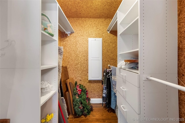 1510 S College Ave, Tulsa, OK 74104 - spacious closet featuring wood finished floors