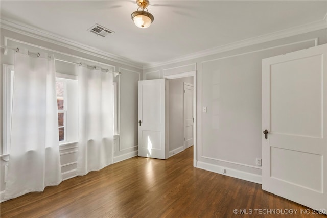 1510 S College Ave, Tulsa, OK 74104 - unfurnished bedroom featuring wood finished floors and ornamental molding