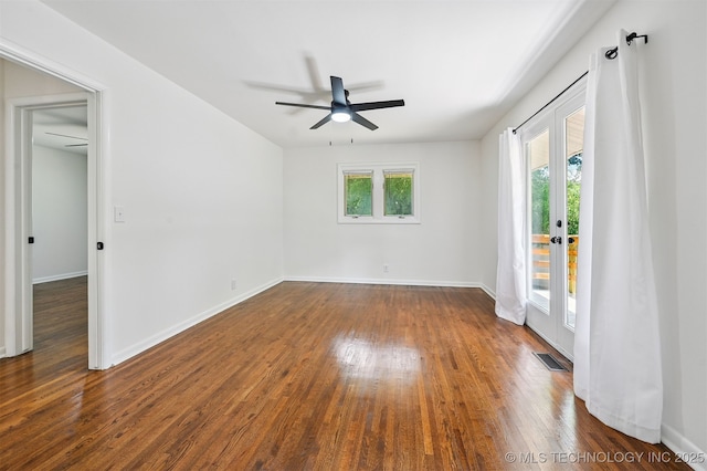 10 E 31st Pl, Sand Springs, OK 74063 - empty room with ceiling fan, dark wood-style flooring, and french doors