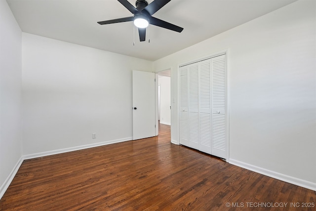 10 E 31st Pl, Sand Springs, OK 74063 - unfurnished bedroom featuring a closet, wood finished floors, and a ceiling fan
