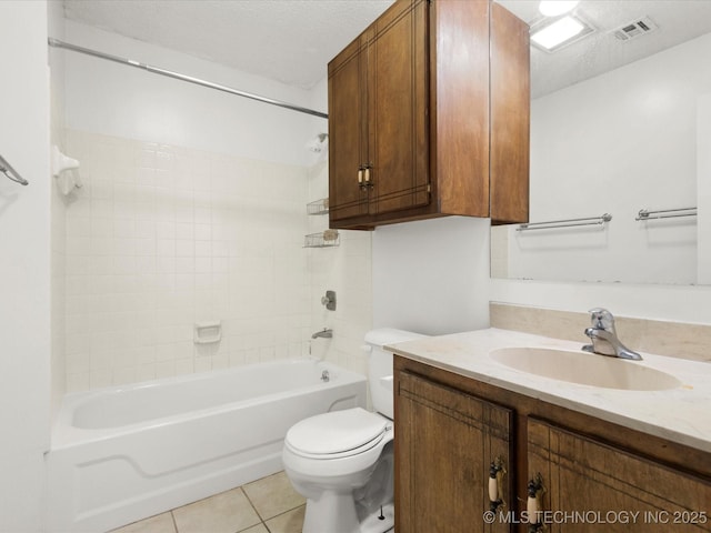 317 NE Autumn Ct, Bartlesville, OK 74006 - full bath featuring vanity, shower / washtub combination, tile patterned flooring, and a textured ceiling