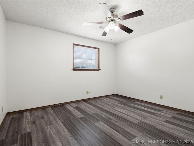 317 NE Autumn Ct, Bartlesville, OK 74006 - unfurnished room with dark wood-type flooring, a textured ceiling, and a ceiling fan