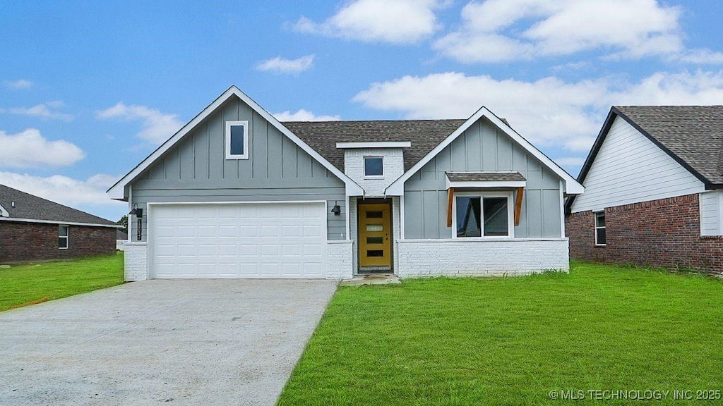 10037 E 132nd St S, Bixby, OK 74014 - view of front of property with board and batten siding, driveway, a front lawn, and roof with shingles