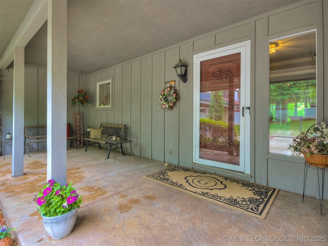 1201 Dogwood Ct, Bartlesville, OK 74006 - doorway to property with board and batten siding