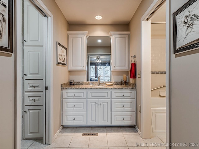 1201 Dogwood Ct, Bartlesville, OK 74006 - bathroom featuring vanity, tile patterned flooring, recessed lighting, and shower / washtub combination