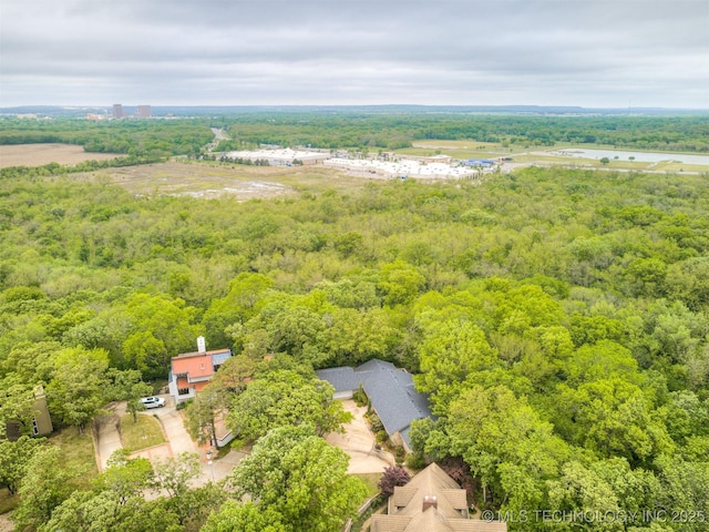 1201 Dogwood Ct, Bartlesville, OK 74006 - bird's eye view of a heavily wooded area