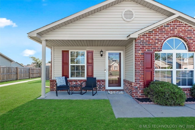 8745 S 261st E Ave, Broken Arrow, OK 74014 - doorway to property with brick siding and a porch