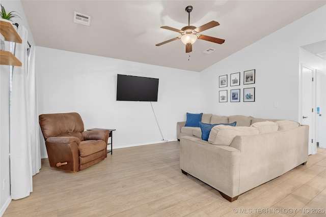 8745 S 261st E Ave, Broken Arrow, OK 74014 - living room with lofted ceiling, a ceiling fan, and light wood-style flooring