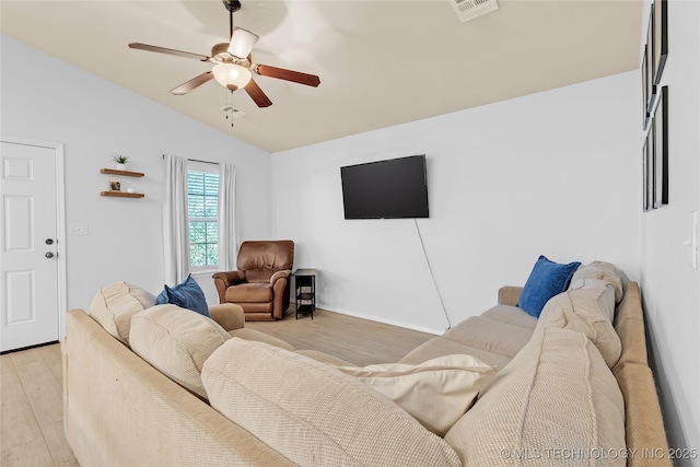 8745 S 261st E Ave, Broken Arrow, OK 74014 - living room with lofted ceiling, light wood finished floors, and a ceiling fan