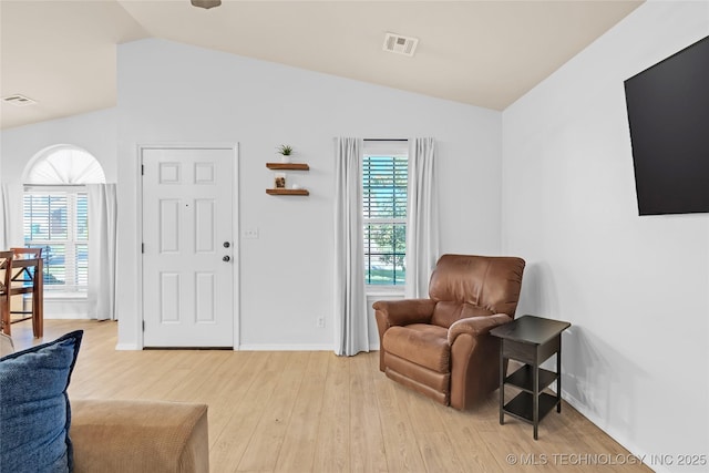8745 S 261st E Ave, Broken Arrow, OK 74014 - sitting room featuring lofted ceiling, light wood-style flooring, and plenty of natural light