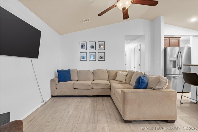 8745 S 261st E Ave, Broken Arrow, OK 74014 - living room with lofted ceiling, light wood finished floors, and a ceiling fan