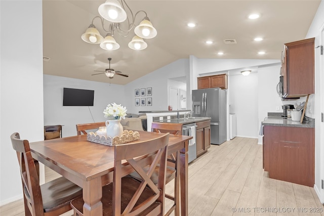 8745 S 261st E Ave, Broken Arrow, OK 74014 - dining space featuring vaulted ceiling, a ceiling fan, light wood-style flooring, a chandelier, and recessed lighting