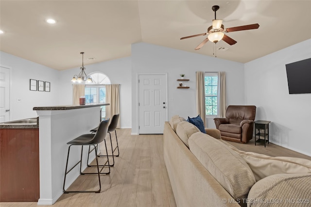8745 S 261st E Ave, Broken Arrow, OK 74014 - living area with lofted ceiling, ceiling fan, light wood-style floors, a chandelier, and recessed lighting