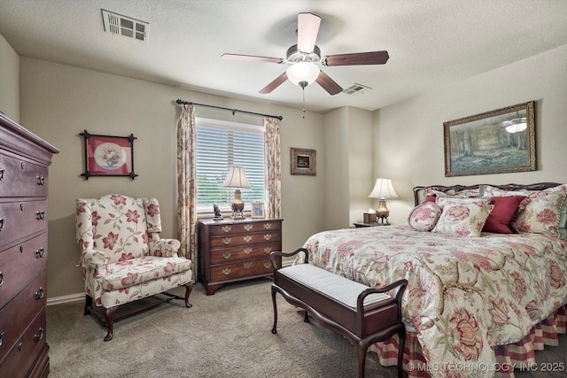 11248 S 75th Ave E, Bixby, OK 74008 - bedroom featuring light carpet, ceiling fan, and a textured ceiling
