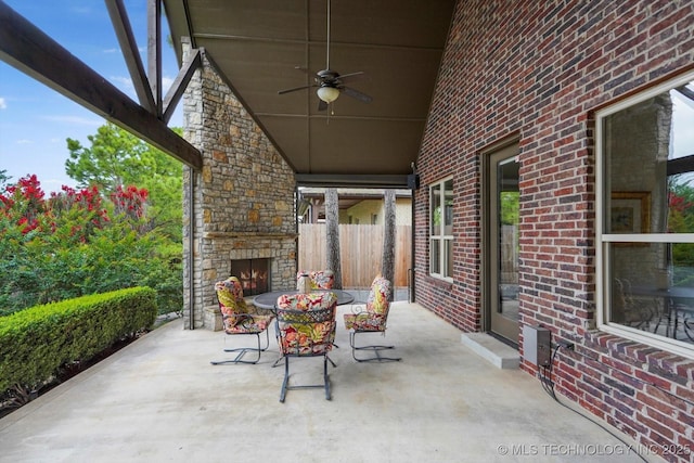 11248 S 75th Ave E, Bixby, OK 74008 - view of patio with an outdoor stone fireplace and ceiling fan