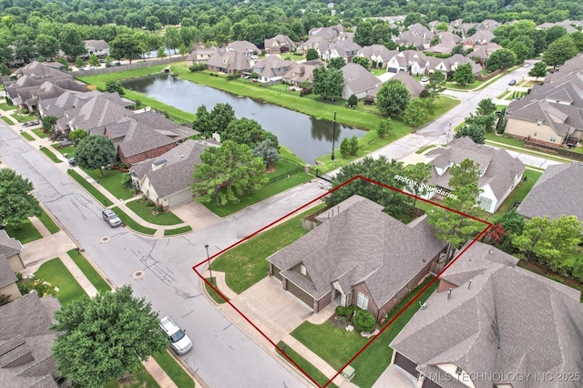 11248 S 75th Ave E, Bixby, OK 74008 - aerial view of residential area with a large body of water and property parcel outlined