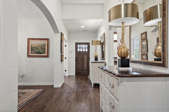 11248 S 75th Ave E, Bixby, OK 74008 - foyer entrance with dark wood-style floors, arched walkways, and recessed lighting