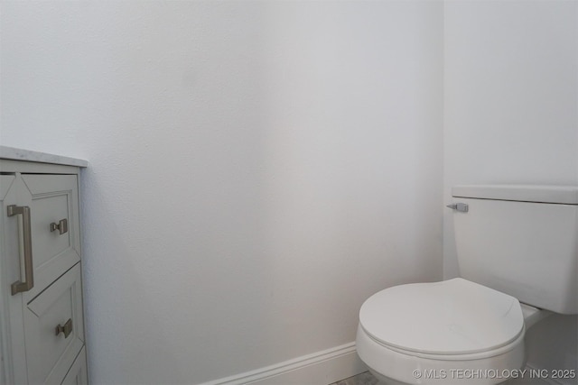 209 E Falletti Ave, Claremore, OK 74017 - bathroom with toilet and baseboards