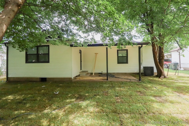 209 E Falletti Ave, Claremore, OK 74017 - rear view of property with a lawn and a patio