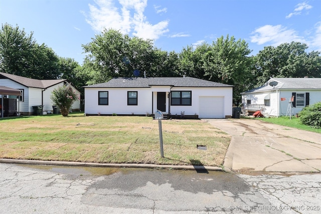 209 E Falletti Ave, Claremore, OK 74017 - view of front facade with a garage, concrete driveway, and a front yard