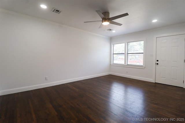 209 E Falletti Ave, Claremore, OK 74017 - spare room featuring crown molding, dark wood-style floors, ceiling fan, and recessed lighting