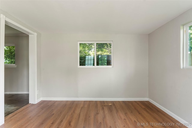 2904 S Hudson Pl, Tulsa, OK 74114 - empty room featuring wood finished floors and baseboards